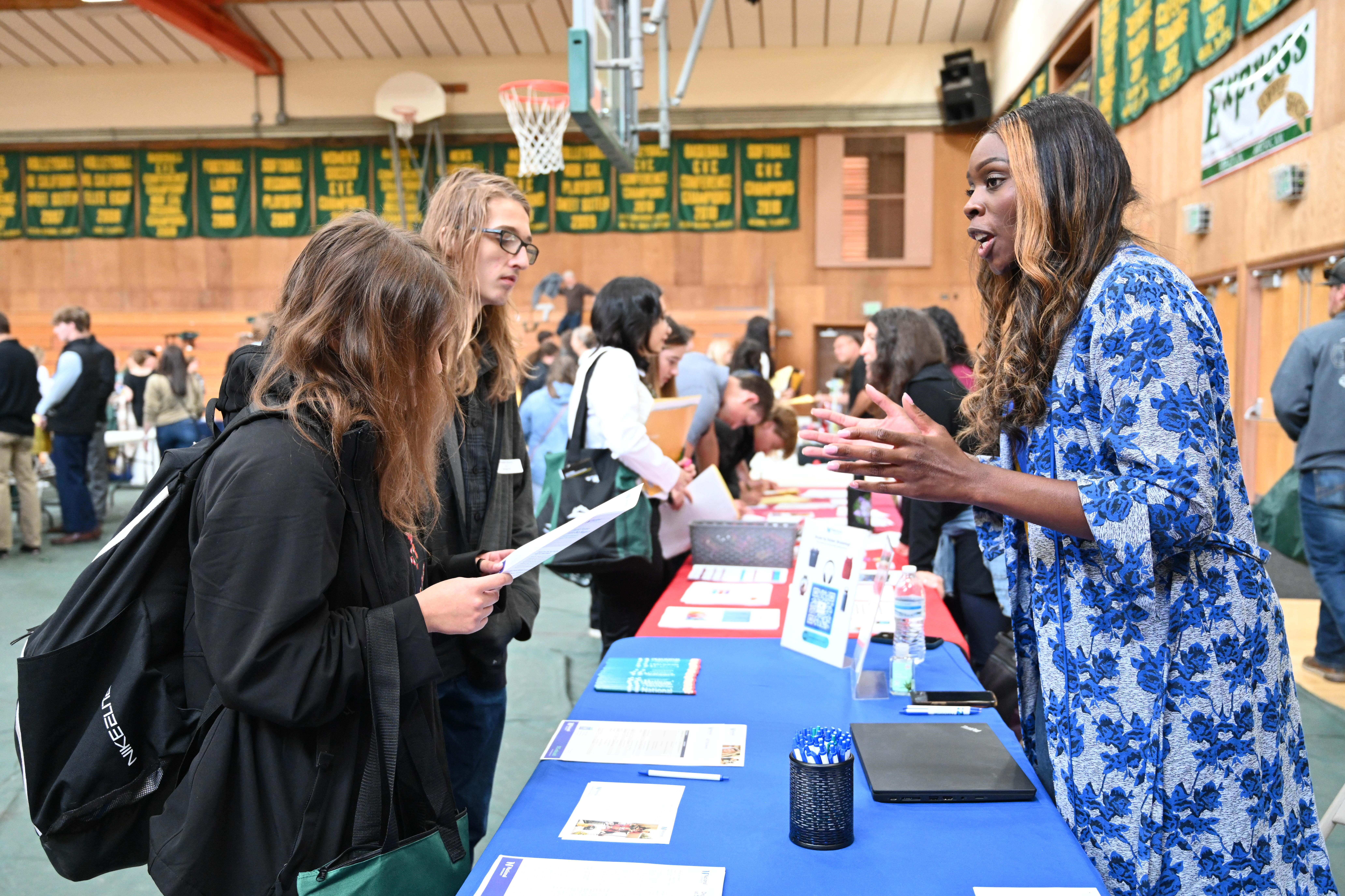 Speaking with students at the job fair